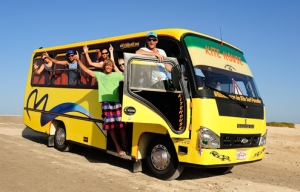 The kite bus filled with numerous happy guests on the way to the 7BFT KiteHouse