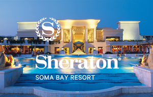 Sheraton Somabay Resort – A stunning beachfront hotel at the Red Sea, Egypt, featuring a grand entrance and illuminated pool area at dusk.